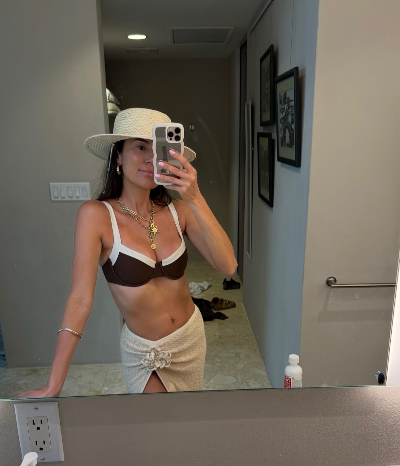 Christine Andrew in brown bikini on beach vacation